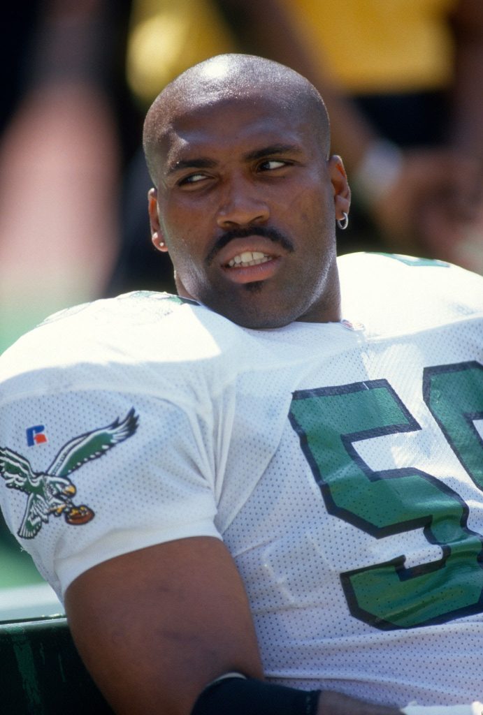 Seth Joyner #59 of the Philadelphia Eagles looks on from the bench against the Green Bay Packers during an NFL football game